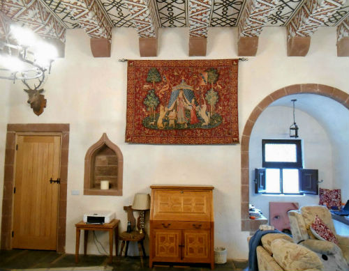 A Mon Seul Desir tapestry hanging in a tower