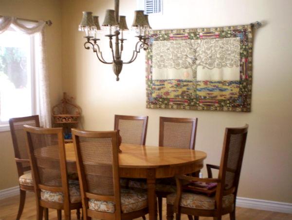 Klimt Tree of Life tapestry in a dining room