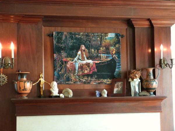 The Lady of Shalott tapestry above a fireplace